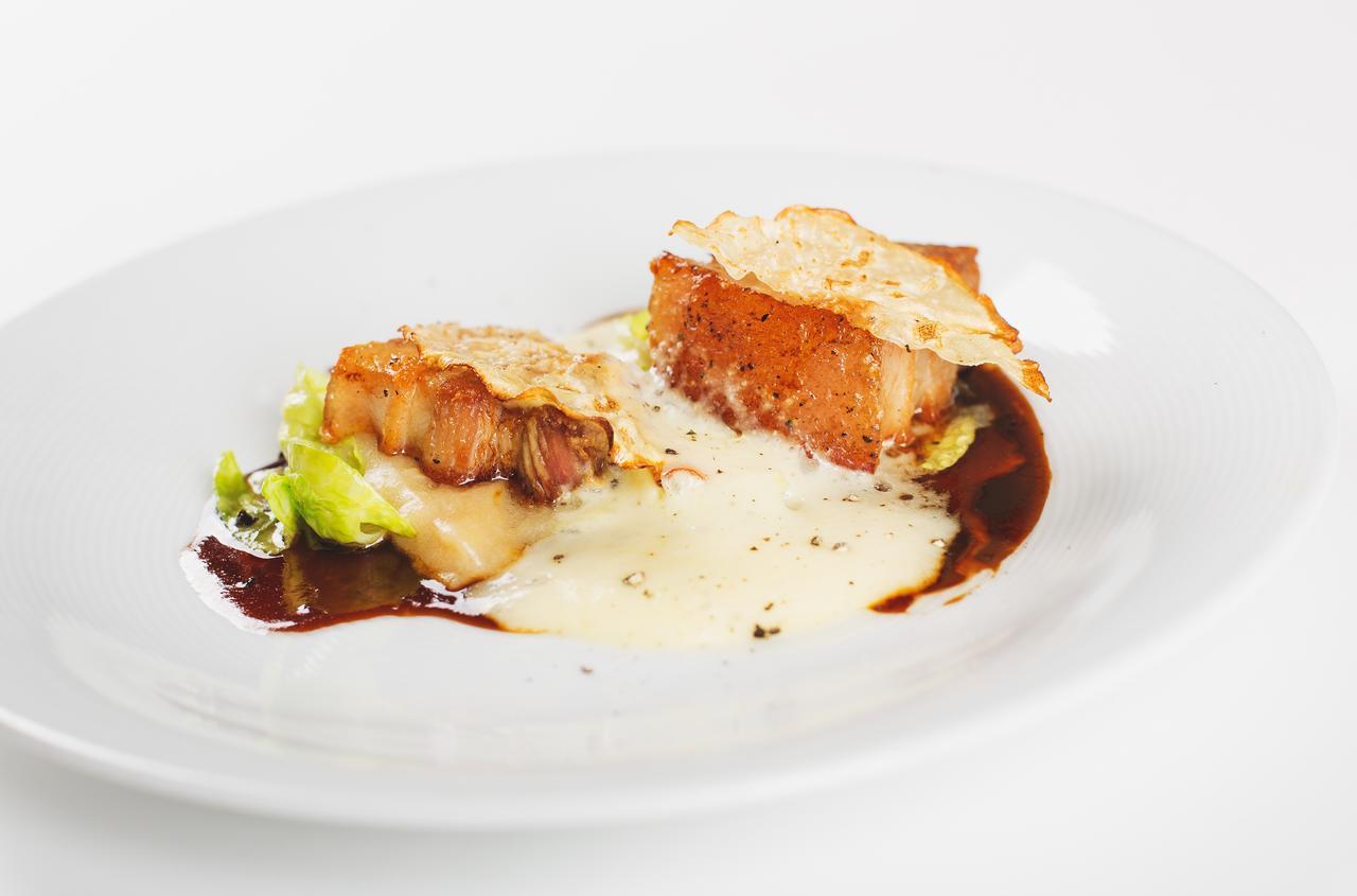 Retro Riverside Wellness Resort Karlovy Vary Bagian luar foto A prepared dish of monkfish